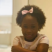 Gabrielle is registered to the contest to win money with this photo: accessories, bodypart, child, clothing, earring, face, female, girl, hair, happy, head, jewelry, mouth, necklace, person, photography, portrait, smile, t_shirt, teeth