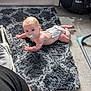 baby, baby_boy, baby_girl, bare_skin, car_seat, car_seat_accessory, carpet, carpet_rug, child, curious, cute, diaper, floor, home, indoor, infant, lying_down, pacifier, rug, soft_texture