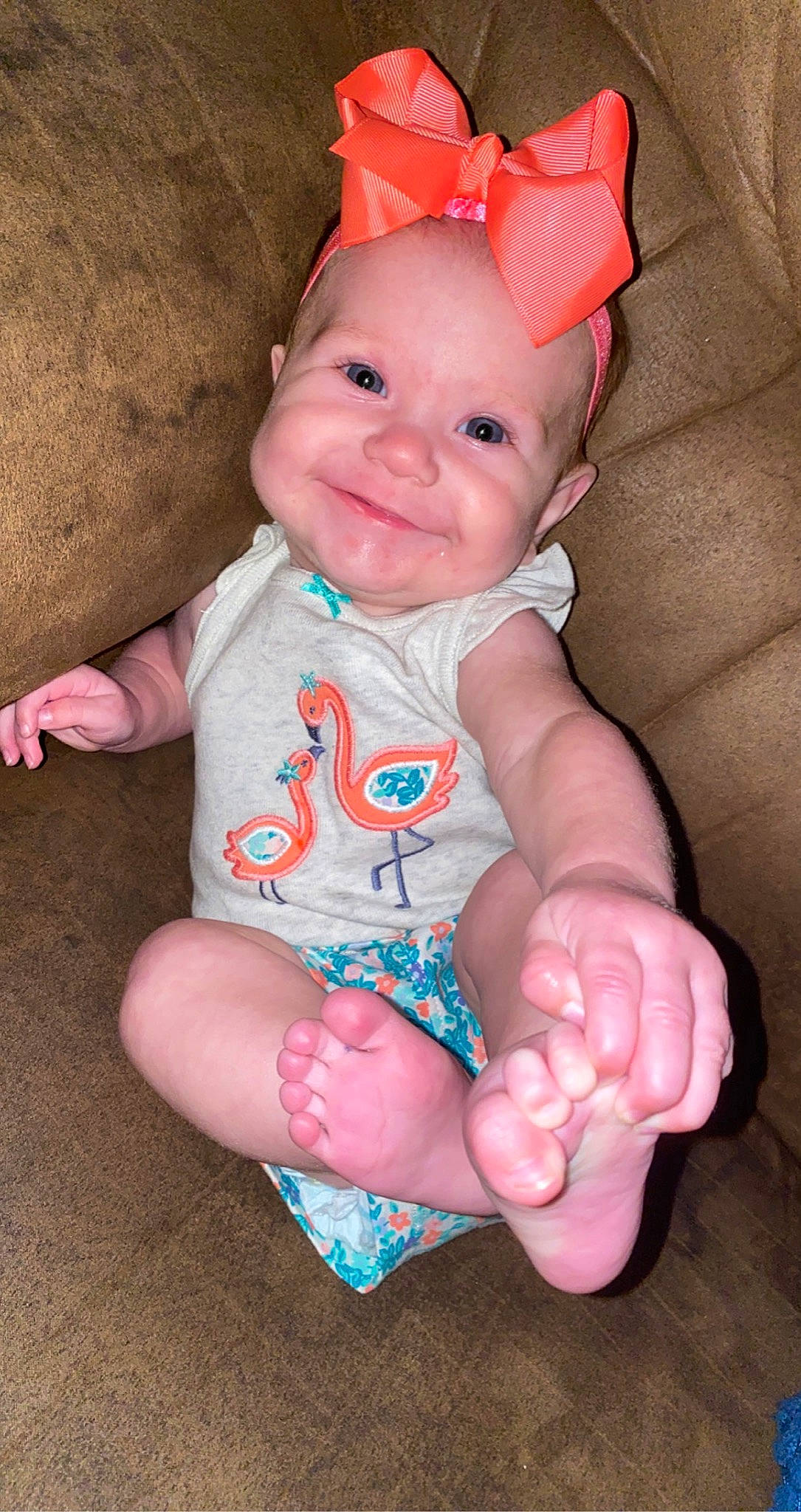 Marleigh is registered to the contest to win money with this photo: baby, baby_toddler_clothing, cap, cheek, clothing, costume_hat, eye, face, finger, hat, head, headgear, human_body, joy, party_hat, person, pink, red, skin, sleeve