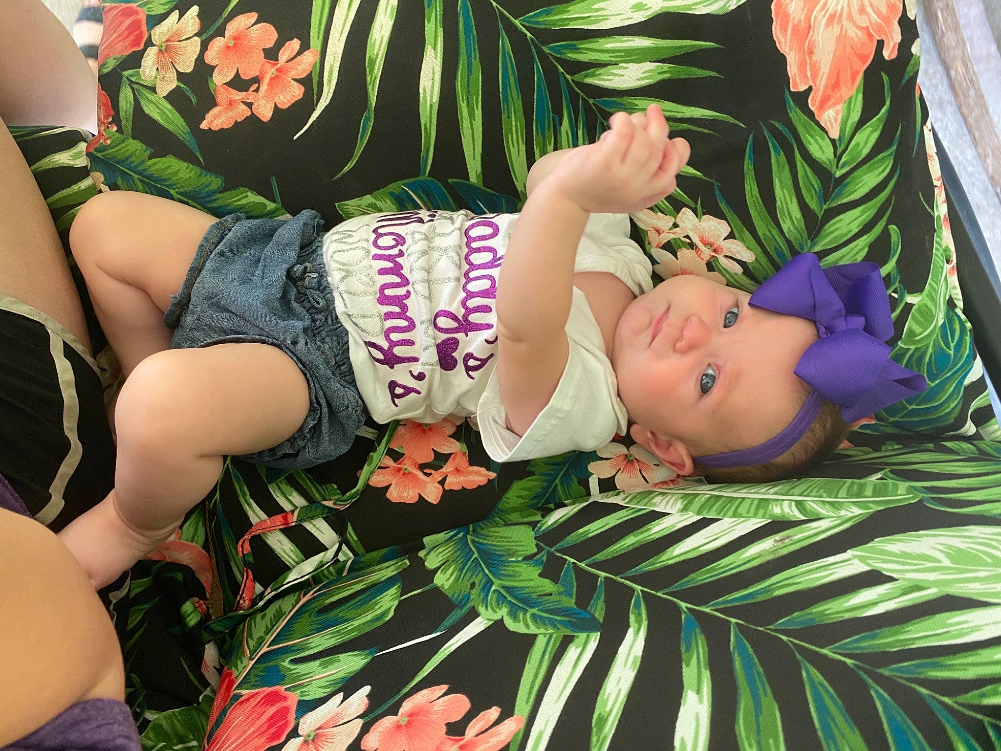 Marleigh is registered to the contest to win money with this photo: abdomen, black_hair, chest, child, fashion, grass, green, happy, human_leg, jean_short, knee, leaf, leisure, navel, pattern, people_in_nature, person, plant, thigh, trunk