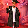 child, graduation, gown, cap, diploma, portrait, smile, standing, dress, shoes, wooden_floor, colorful_background, pink, purple, celebration, formal_wear, young_child, happy, indoor, photography