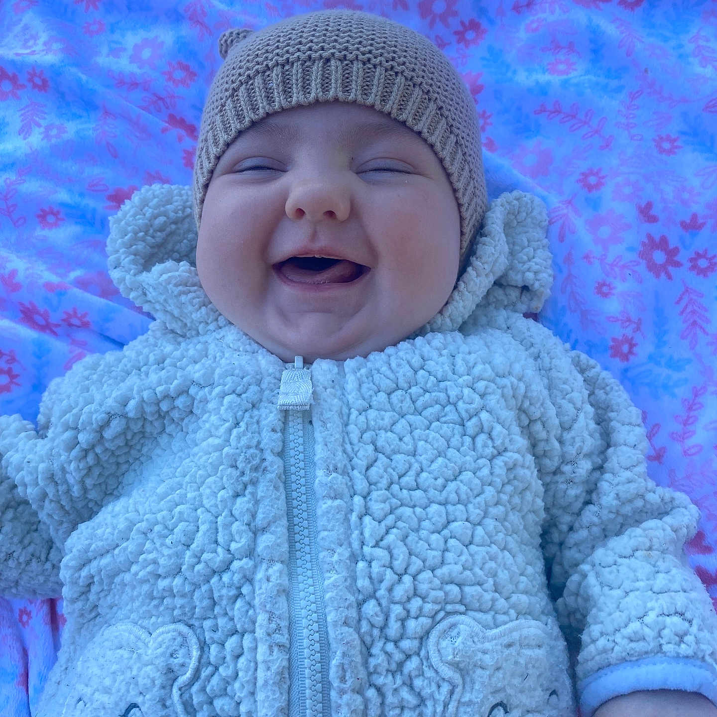 Scarlitt joined the competition — help win amazing prizes! baby, beanie, bonnet, cap, clothing, coat, face, happy, hat, head, hood, jacket, knitwear, newborn, person, photography, portrait, purple, smile, sweater