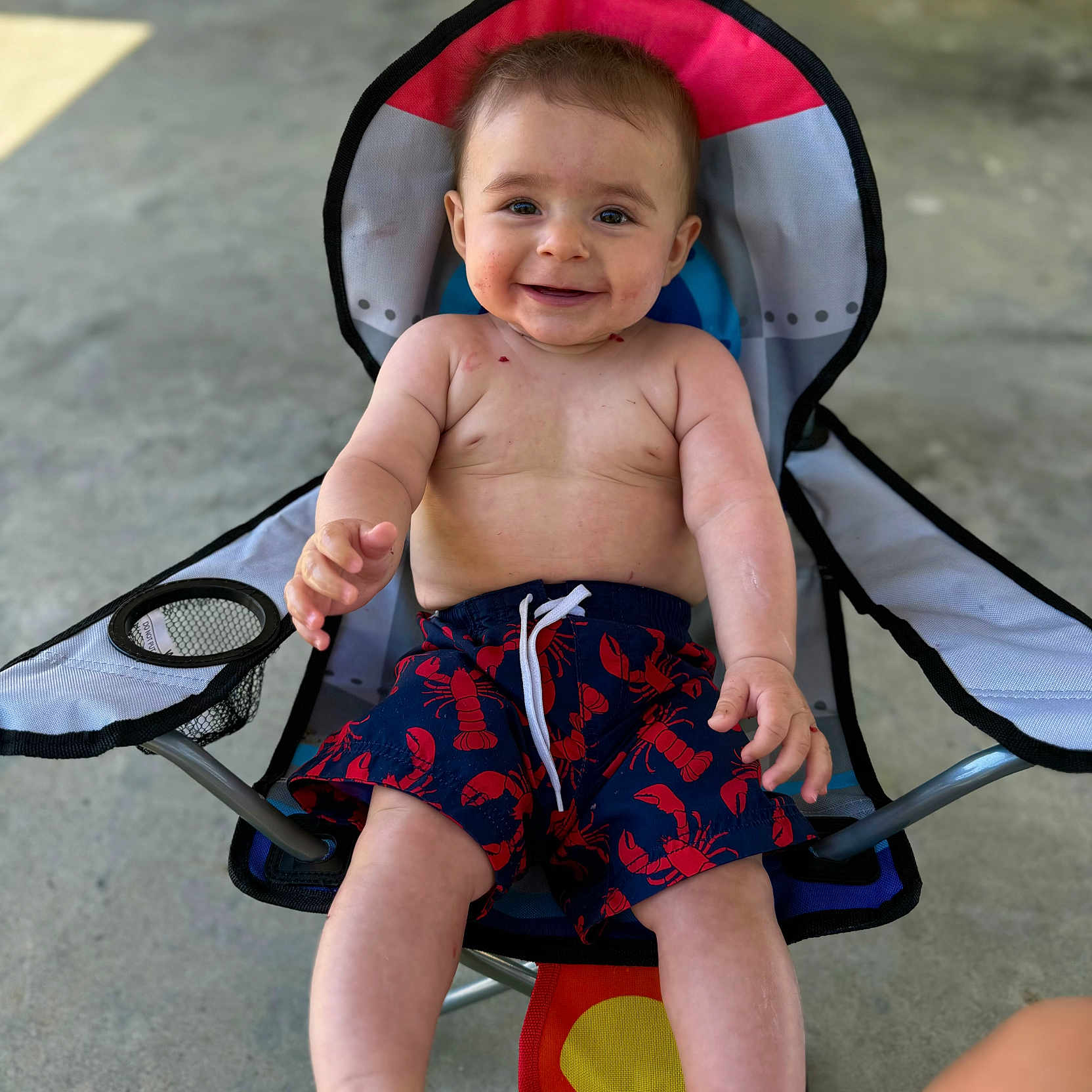 Kohen joined the competition — help win amazing prizes! baby, ball, bodypart, clothing, face, finger, hand, happy, head, machine, person, photography, portrait, shorts, smile, sport, stroller, tennis, tennisball, wheel