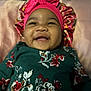 Genesis is registered to the contest to win money with this photo: baby, babylaughing, bonnet, cap, clothing, couch, cushion, dress, face, furniture, happy, hat, head, homedecor, laughing, person, photography, portrait, quilt, smile