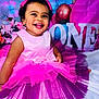 accessories, balloon, child, clothing, costume, dress, earring, face, female, formalwear, girl, happy, head, jewelry, laughing, person, photography, portrait, purple, smile