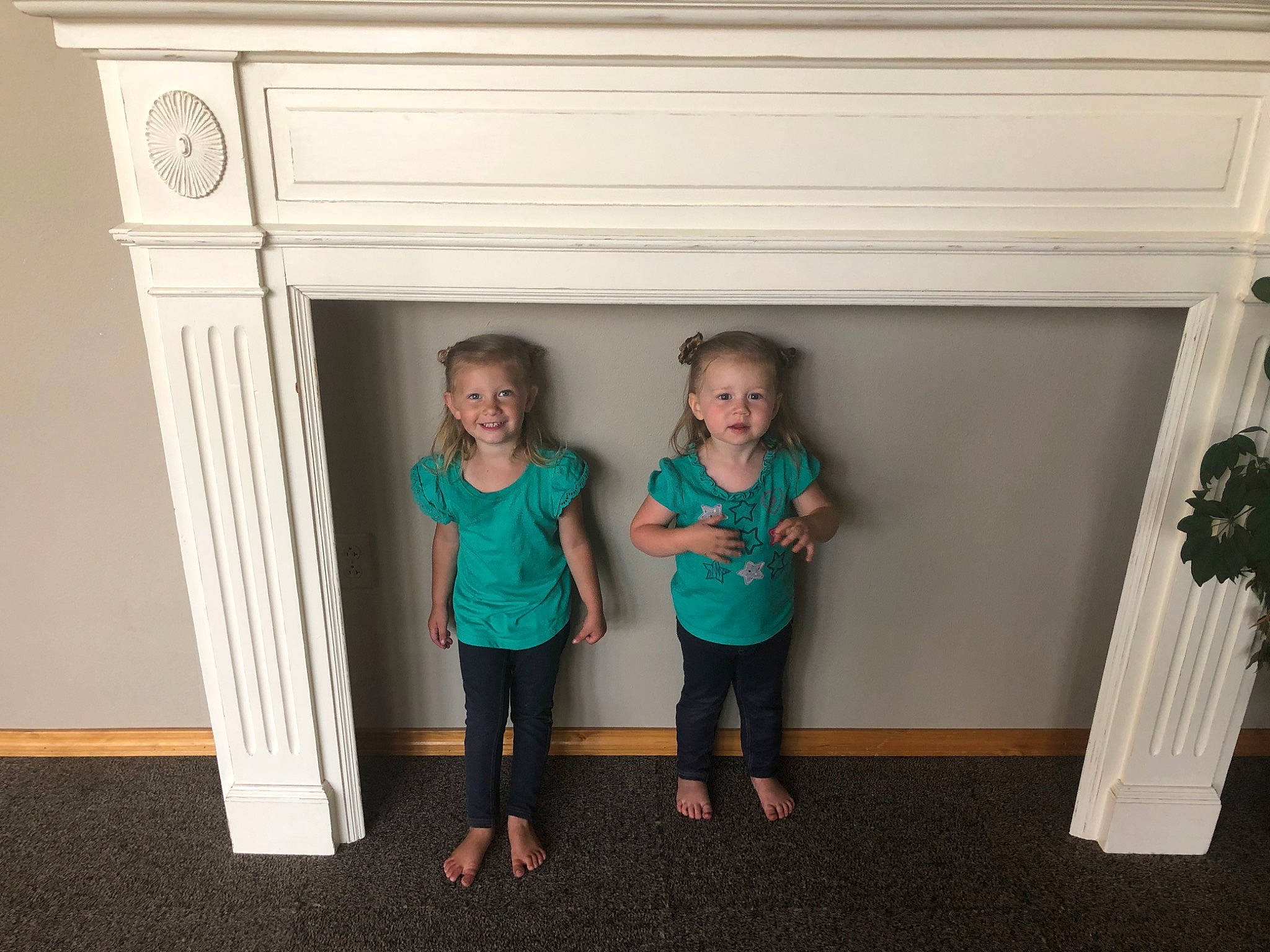 Elise is registered to the contest to win money with this photo: child, floor, furniture, house, interior_design, joy, person, room, standing, table, toddler, turquoise