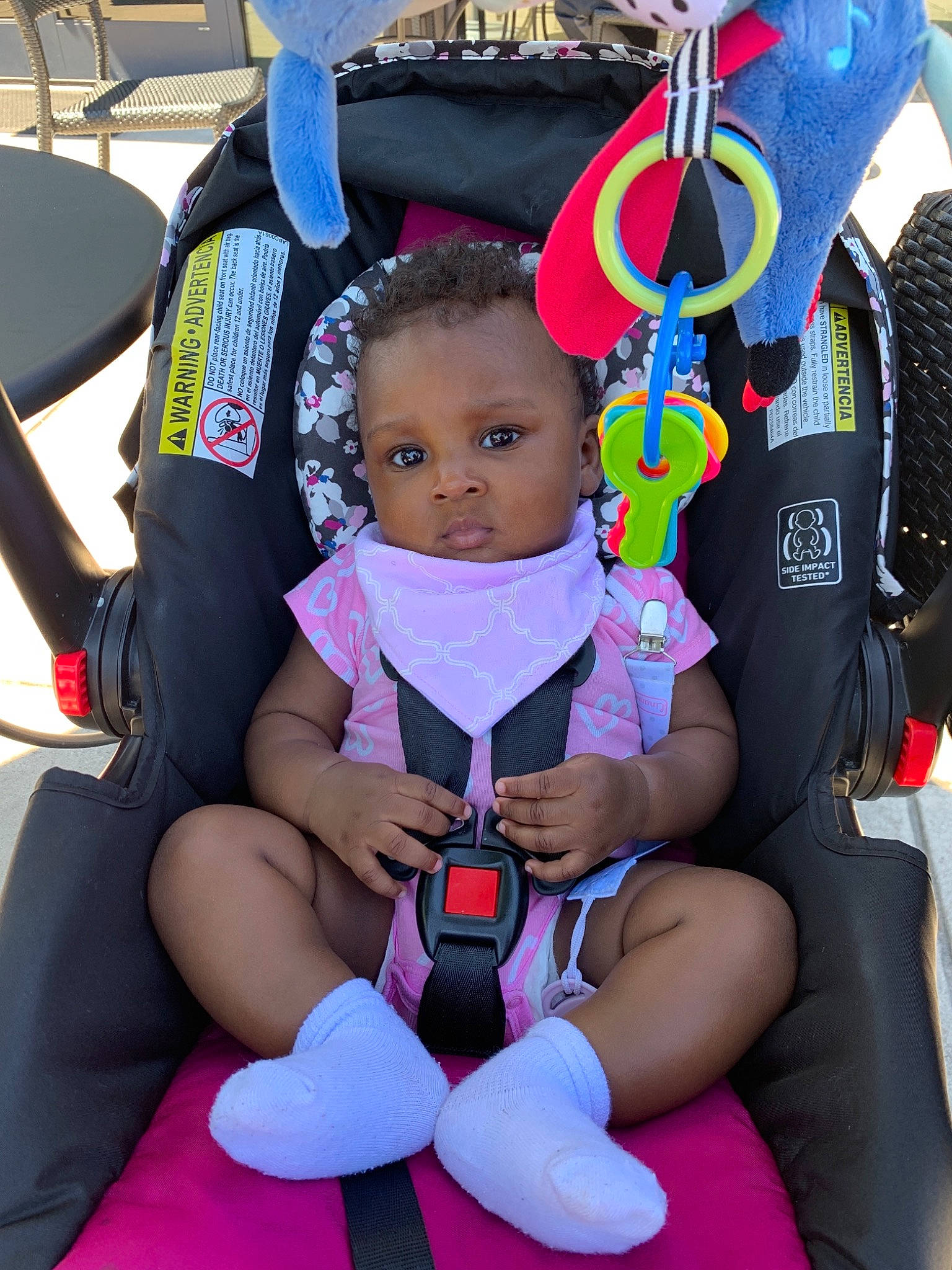Zeniyah is registered to the contest to win money with this photo: auto_part, baby_carriage, baby_in_car_seat, baby_products, car_seat, car_seat_cover, child, person, pink, product, seat_belt, toddler