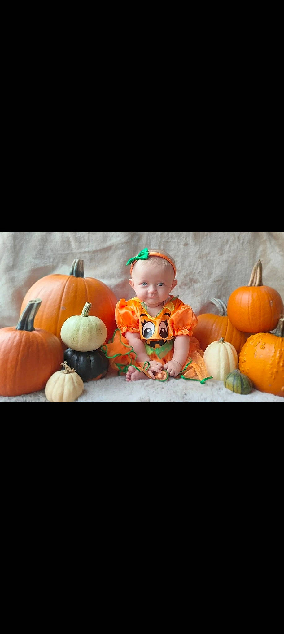Parklyn is registered to the contest to win money with this photo: baby, baby_toddler_clothing, calabaza, couch, cucurbita, eye, fruit, gourd, grass, happy, natural_foods, orange, person, plant, pumpkin, smile, squash, toddler, vegetable, winter_squash