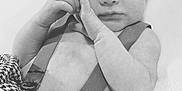 Baylen is registered to the contest to win money with this photo: baby, newborn, infant, sleeping, face, hands, suspenders, blanket, houndstooth_pattern, black_and_white, portrait, close_up, skin, bedding, cute, peaceful, newborn_photography, soft_light, hand_pose, small_person