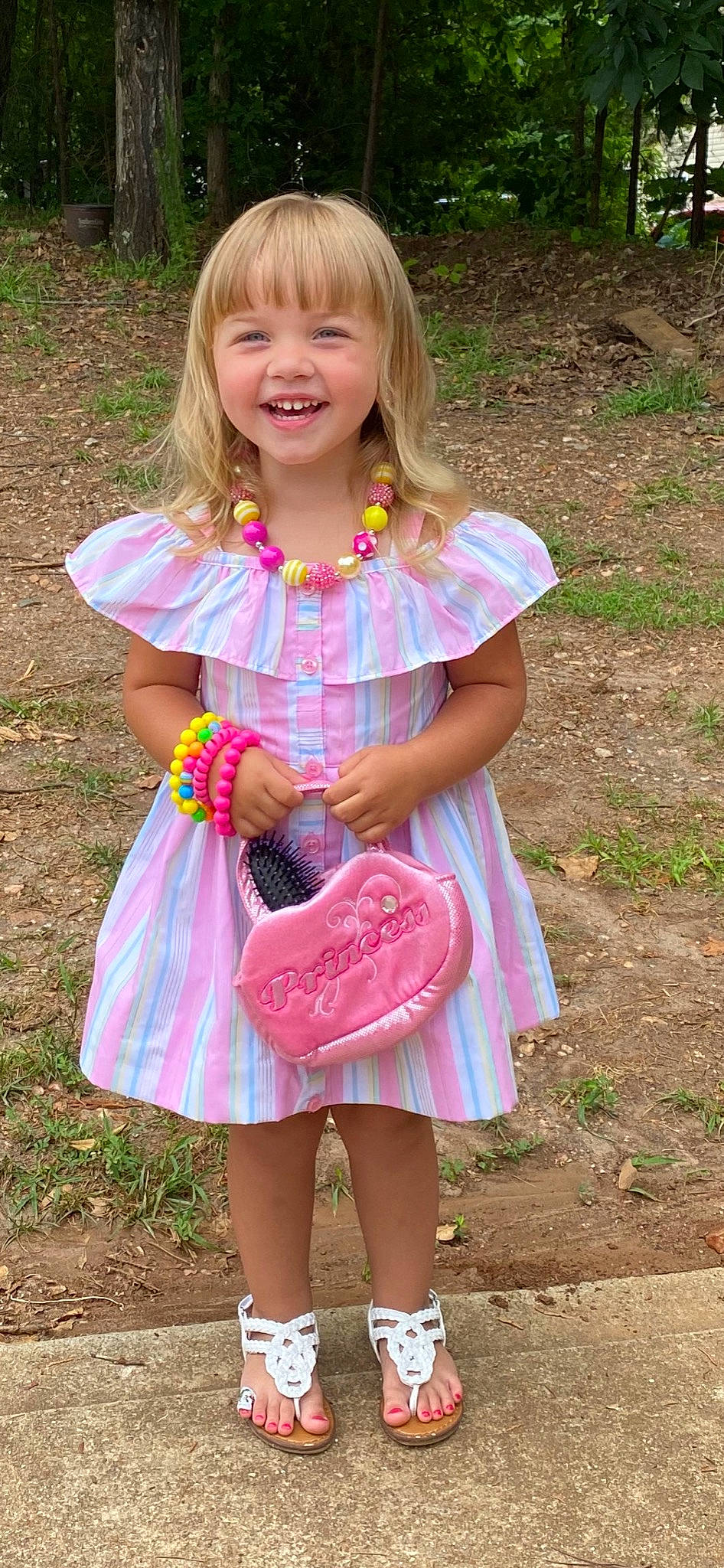 Danika is registered to the contest to win money with this photo: baby_toddler_clothing, botany, child, day_dress, dress, fun, grass, happy, joy, magenta, pattern, people_in_nature, person, photograph, pink, plant, purple, skin, sleeve, smile