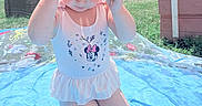 Everleigh is registered to the contest to win money with this photo: toddler, child, swimsuit, sunglasses, pool, water, outdoor, grass, playhouse, summer, sunny, kneeling, toy, van, backyard, person, cute, fashion, sunlight, recreation