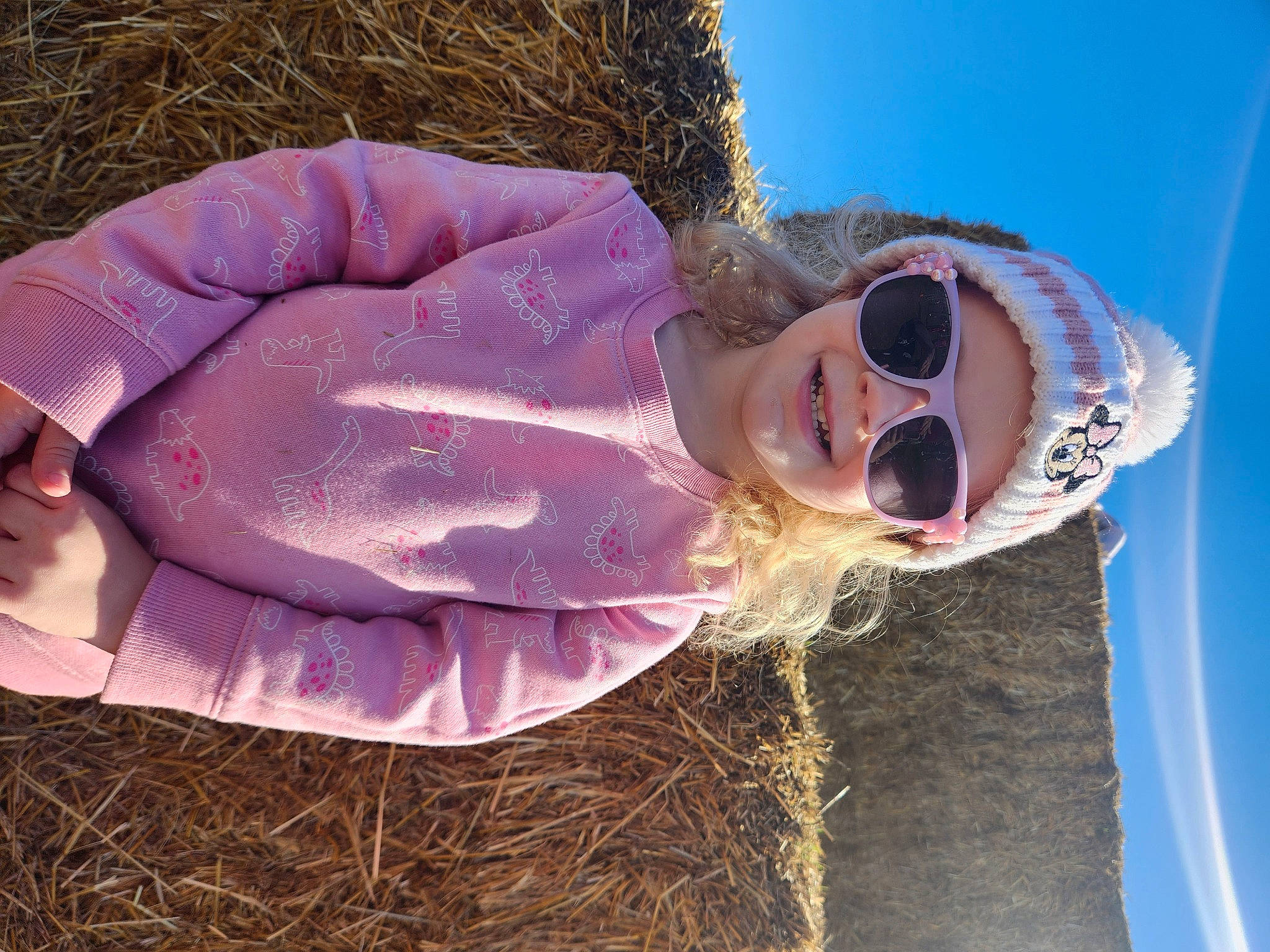 Aliyah is registered to the contest to win money with this photo: eyewear, fun, fur, goggles, grass, grassland, happy, headwear, joy, landscape, leisure, magenta, people_in_nature, person, sky, smile, soil, sunglasses, travel, tree