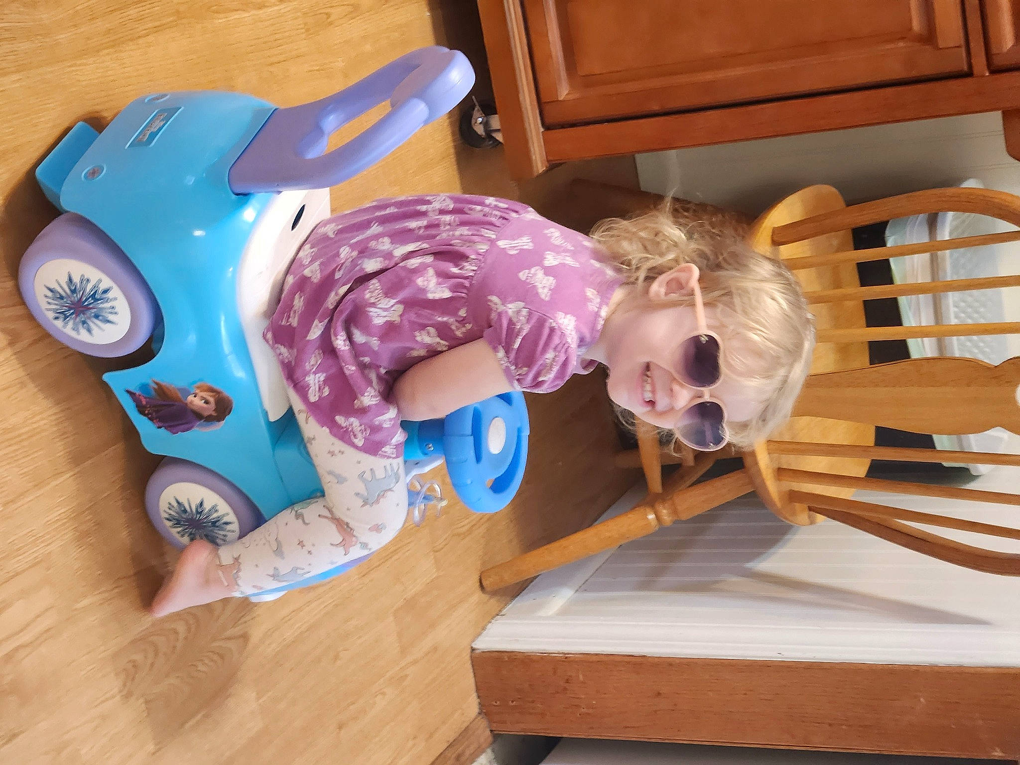 Aliyah joined the competition — help win amazing prizes! baby_toddler_clothing, baby_toys, cabinetry, child, cupboard, electric_blue, flooring, fun, hardwood, joy, machine, person, personal_protective_equipment, plastic, play, room, shelf, toddler, toy, varnish