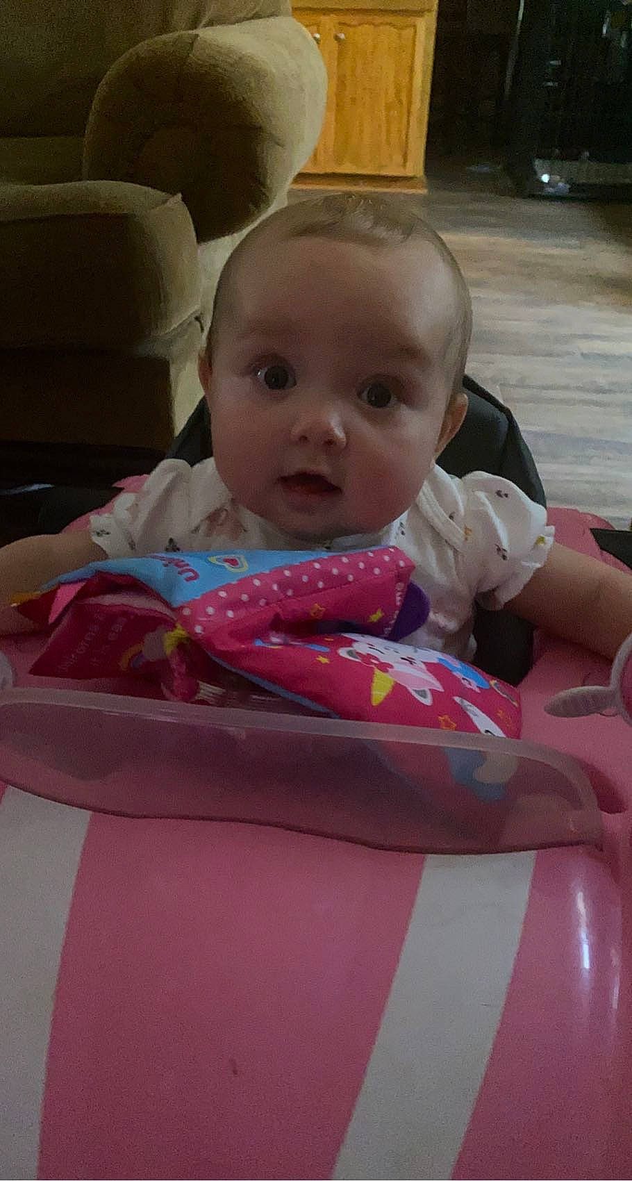 Harland joined the competition — help win amazing prizes! baby, baby_products, baby_toddler_clothing, bib, carmine, cheek, child, comfort, event, facial_expression, fun, happy, lamp, linens, magenta, mouth, person, pink, sitting, skin