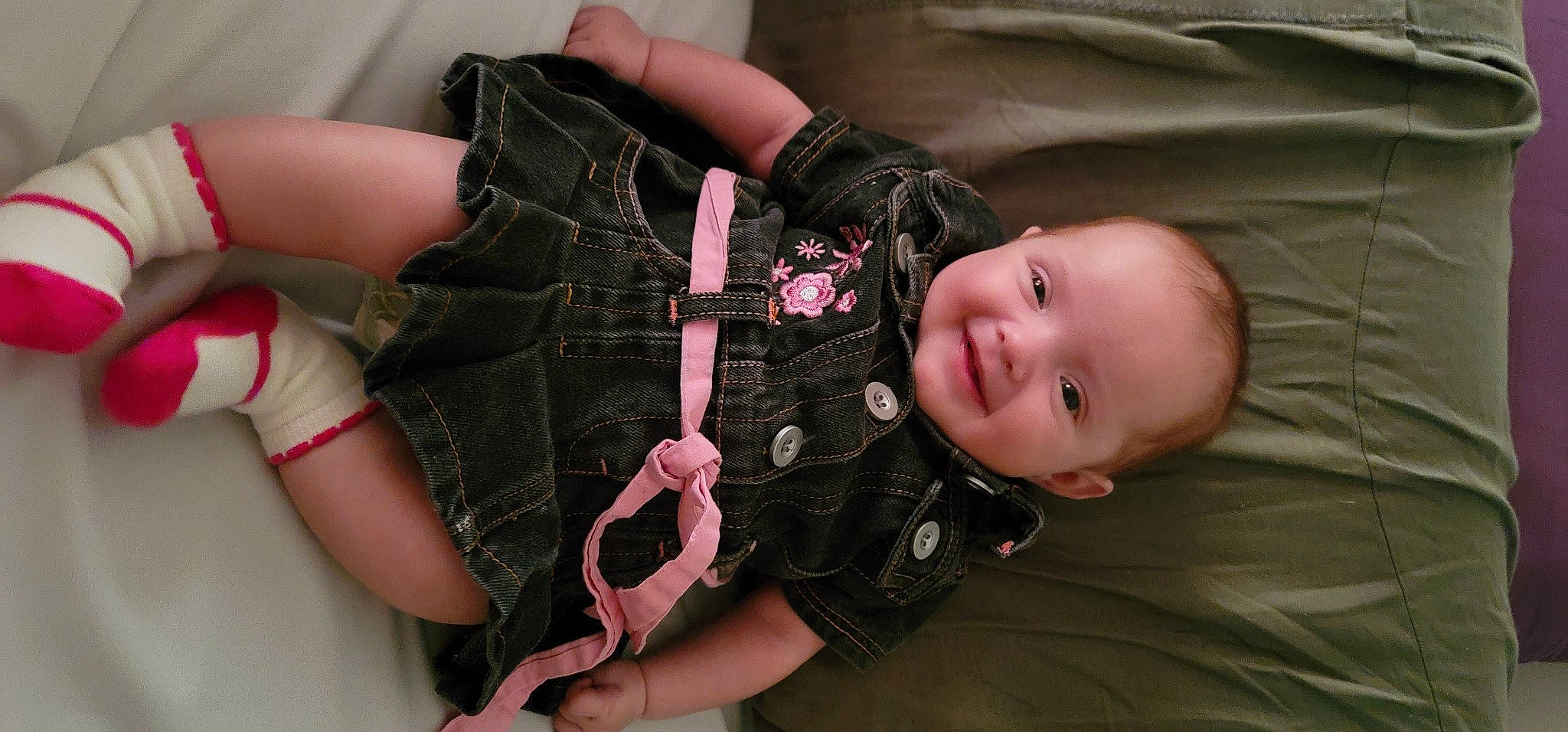 Kenzi joined the competition — help win amazing prizes! baby, baby_toddler_clothing, comfort, finger, flash_photography, gesture, happy, joint, joy, person, pink, plaid, product, skin, sleeve, smile, tartan, textile, thigh, toddler