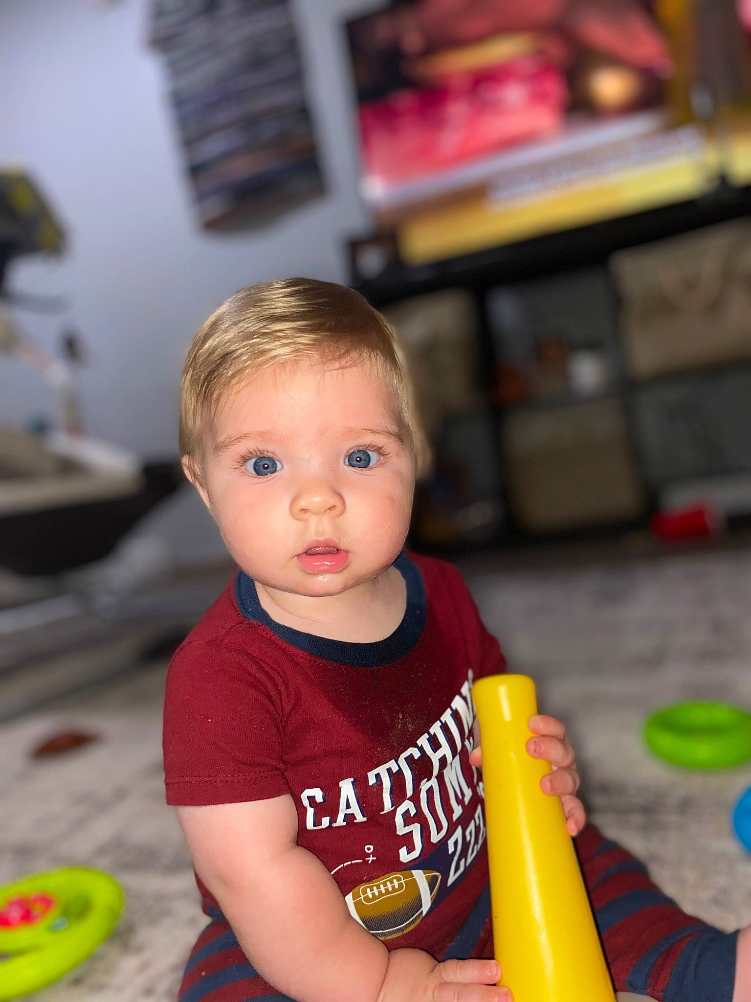 Jaidyn joined the competition — help win amazing prizes! baby, baby_playing_with_toys, baby_toddler_clothing, cheek, child, flooring, fun, happy, leisure, people, person, play, recreation, room, sitting, skin, standing, t_shirt, television, toddler