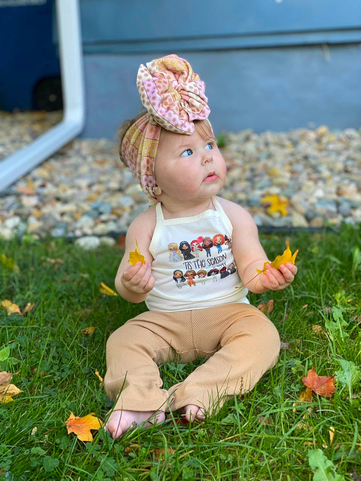 Clementine is registered to the contest to win money with this photo: autumn, baby, baby_toddler_clothing, cap, child, fashion_accessory, garden, grass, grass_family, grassland, happy, hat, headwear, lawn, leaf, peach, people_in_nature, person, plant, portrait_photography
