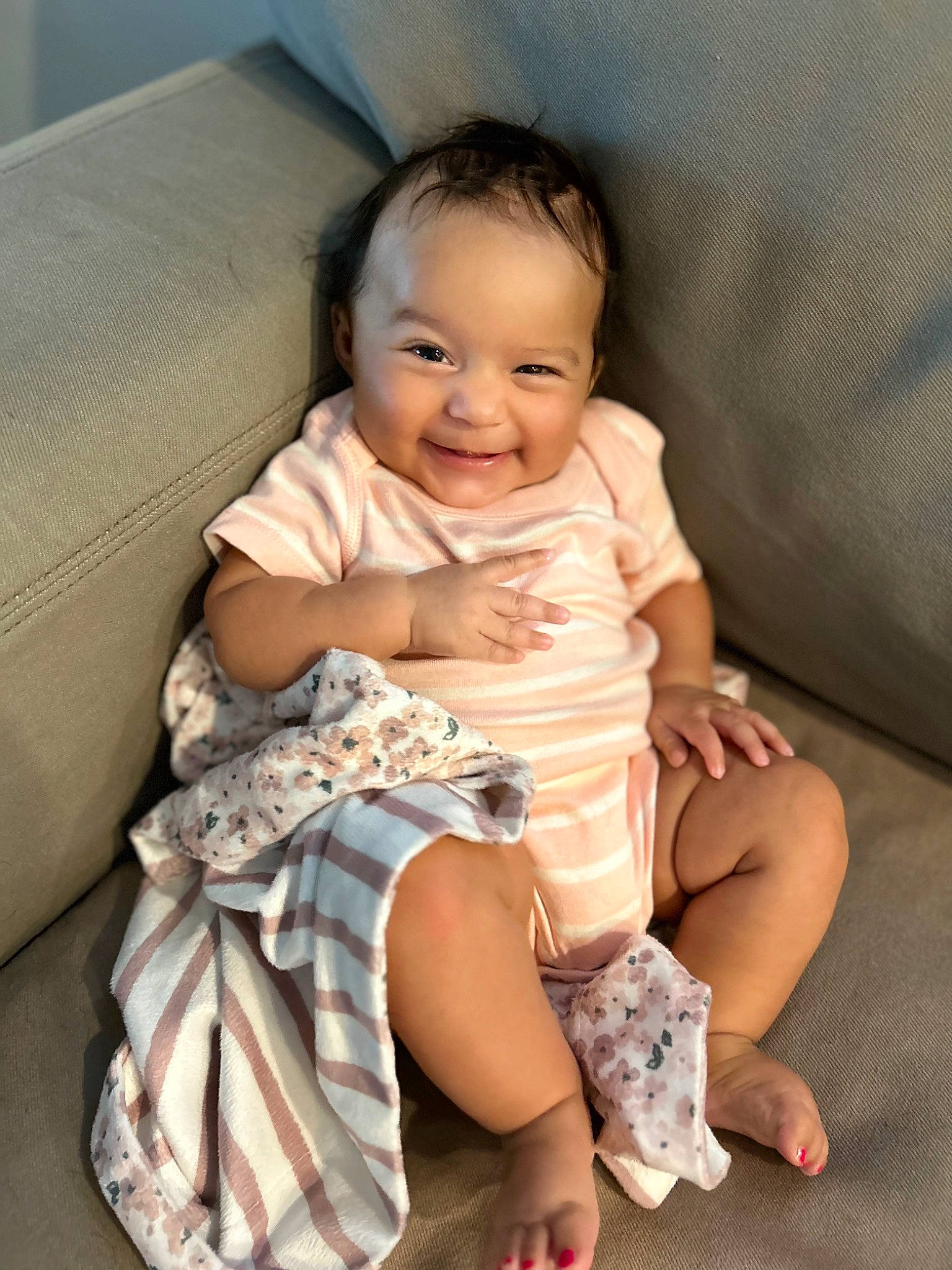 Haidyn is registered to the contest to win money with this photo: baby, baby_toddler_clothing, cheek, child, comfort, dress, flash_photography, foot, happy, human_body, human_leg, joy, knee, leg, neck, person, sitting, skin, sleeve, smile