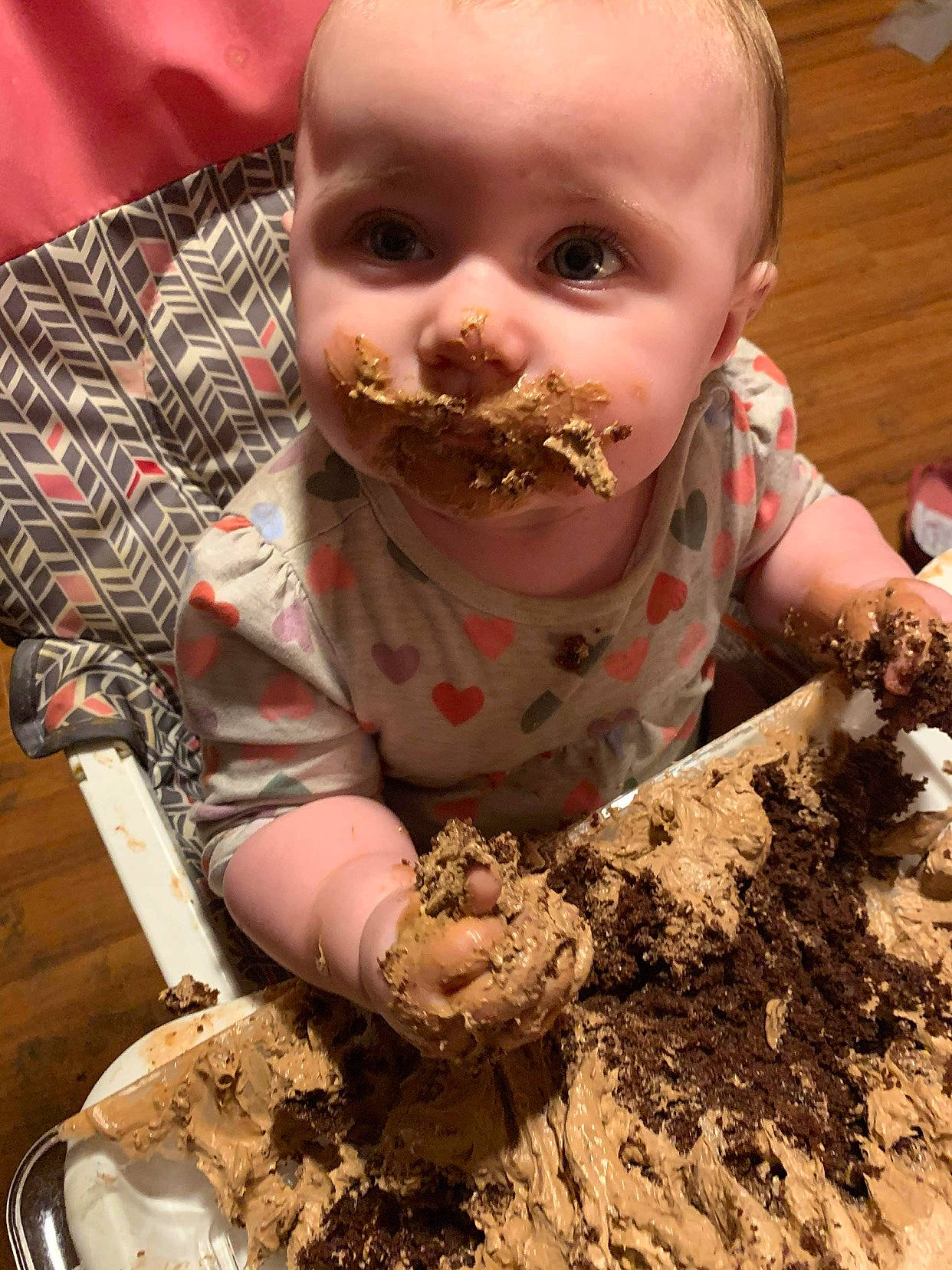 Scarlett is registered to the contest to win money with this photo: adaptation, baby, child, comfort_food, curious, eating, flesh, food_craving, fun, hairstyle, mixture, mud, person, play, saucer, sharing, soil, tableware, toddler