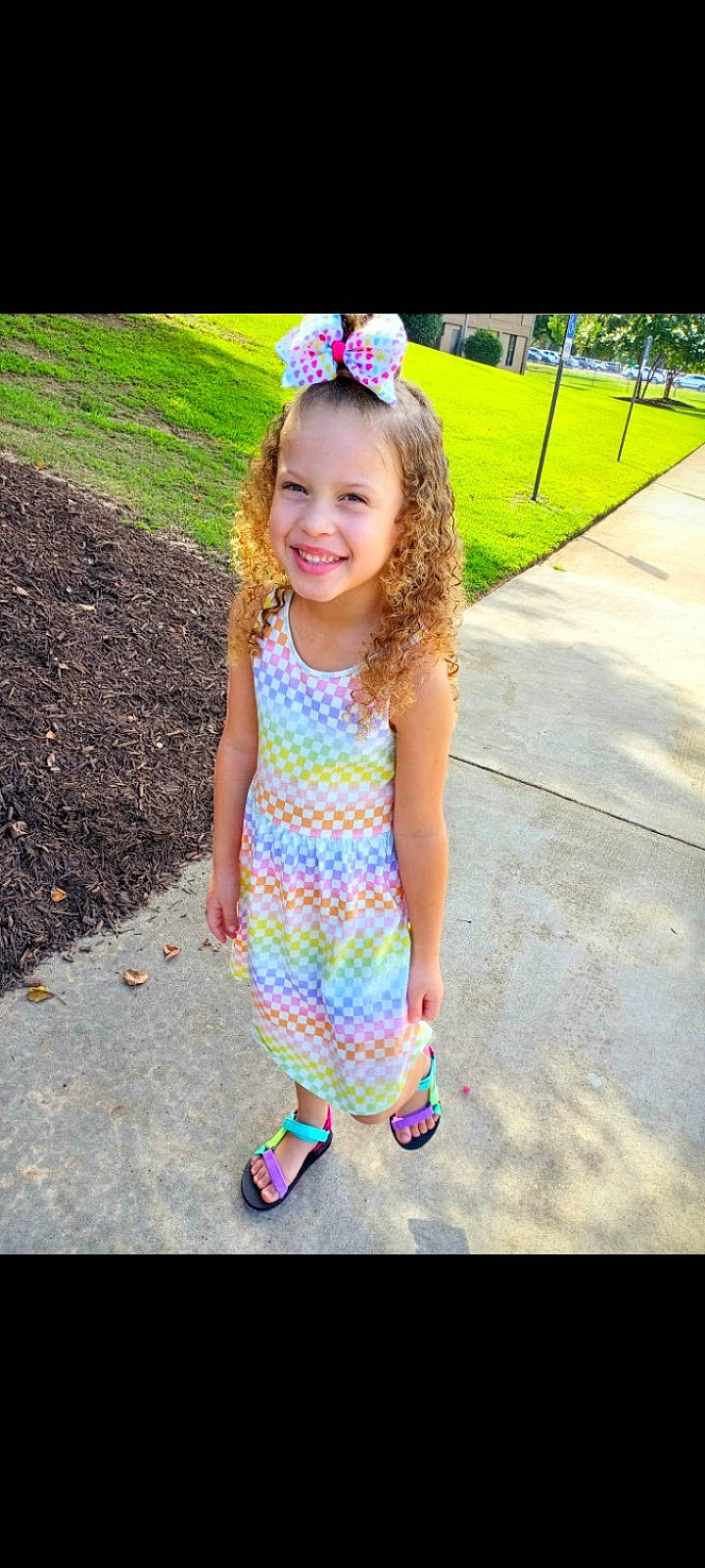 Mckinleigh is registered to the contest to win money with this photo: baby_toddler_clothing, child, cool, electric_blue, fun, grass, hairstyle, happy, joy, leisure, magenta, pattern, people_in_nature, person, pink, play, recreation, sleeve, smile, standing