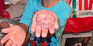 Damon joined the competition — help win amazing prizes! appliance_box, blue_shirt, boy, child, cooking, face, floor_tiles, food, hand, happy, home, indoor, kitchen, meatball, person, plastic_bag, plate, shorts, smiling, table