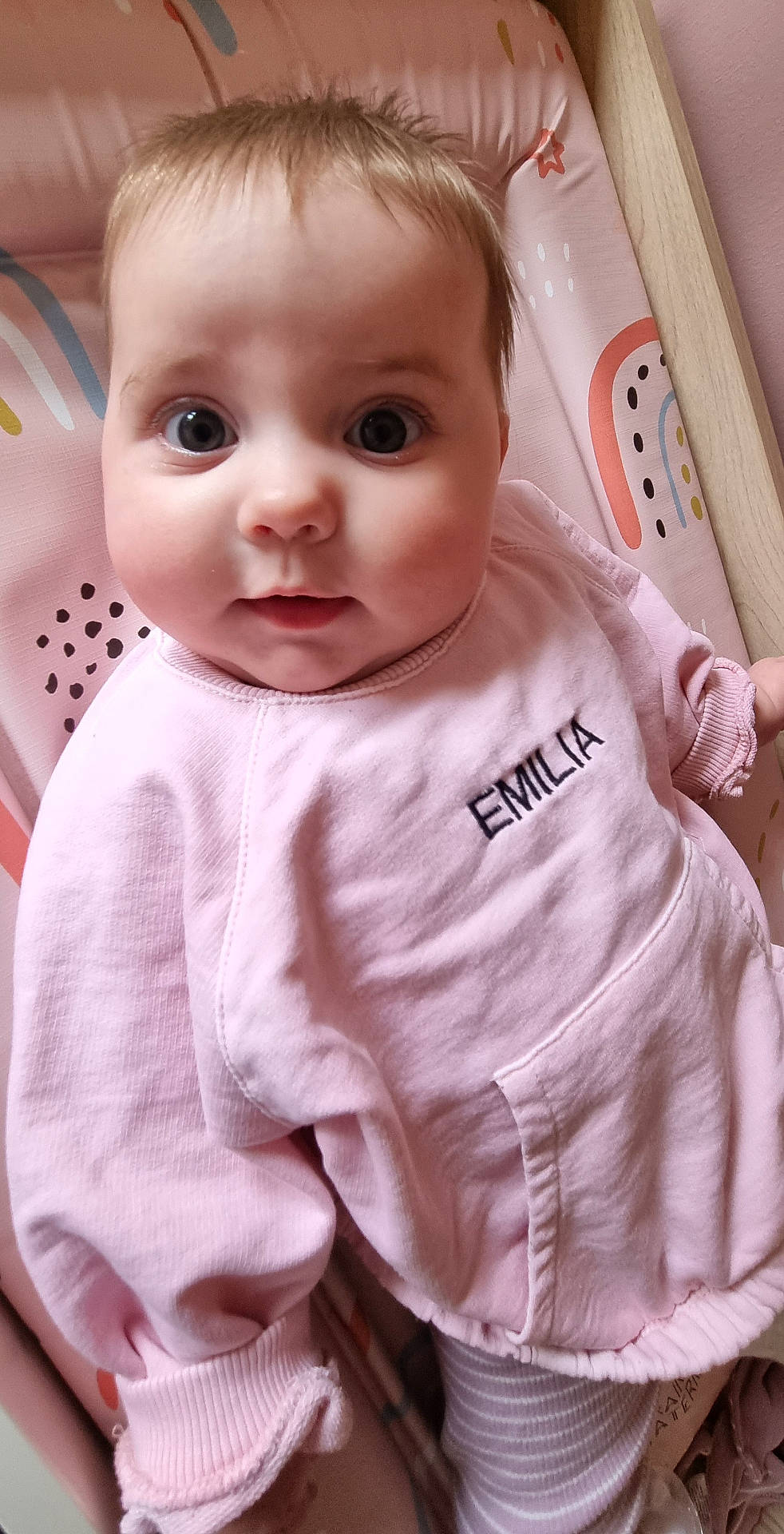 Emilia joined the competition — help win amazing prizes! applique, baby, bodypart, clothing, crib, face, finger, furniture, hand, head, infantbed, knitwear, longsleeve, pants, pattern, person, photography, portrait, sleeve, sweater