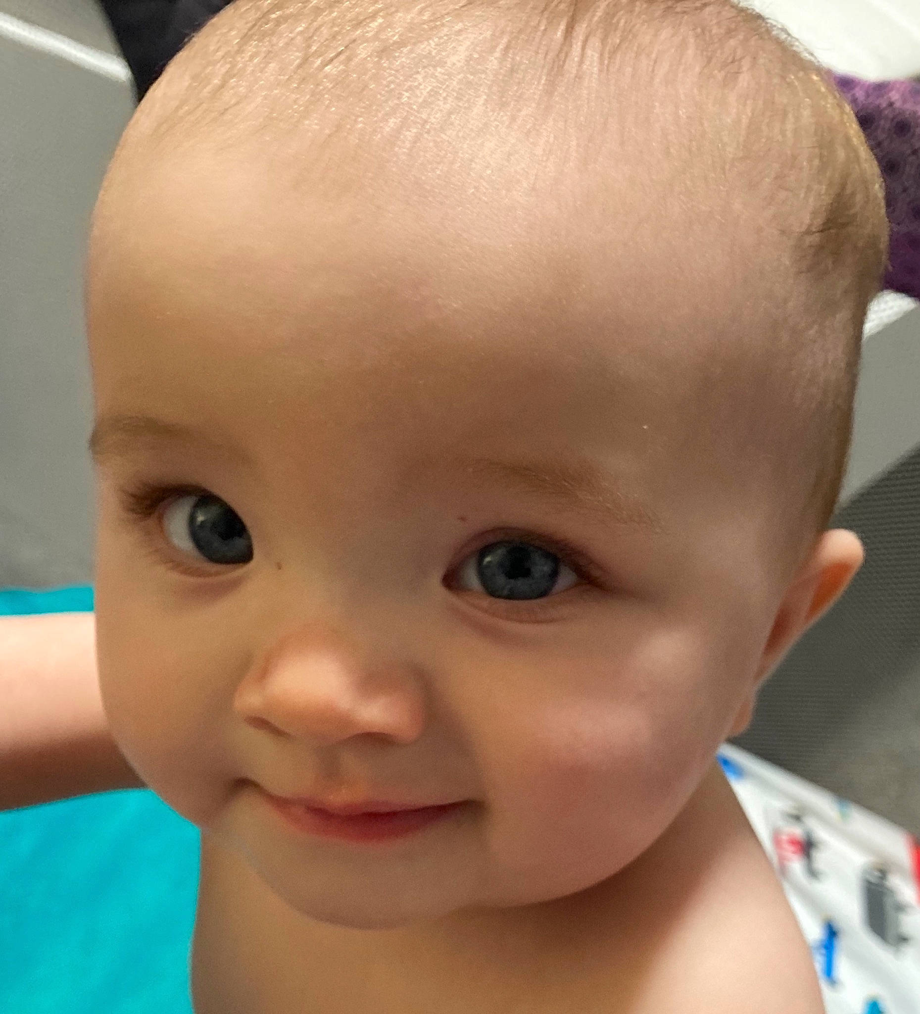 Maddison is registered to the contest to win money with this photo: baby, cheek, child, chin, close_up, ear, eye, eyebrow, face, facial_expression, forehead, hair, hairstyle, head, lip, mouth, neck, nose, person, skin