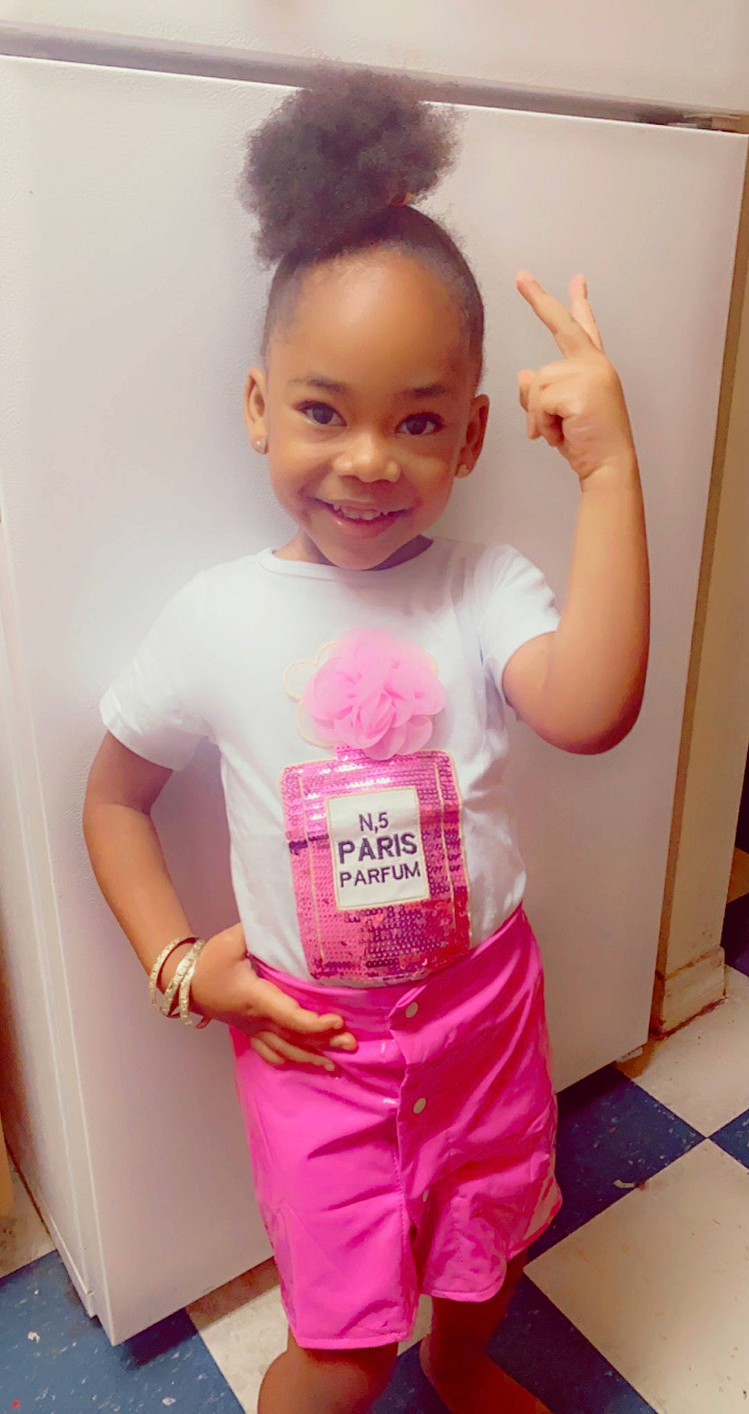 Sariyah Da Cruz is registered to the contest to win money with this photo: arm, baby_toddler_clothing, child, ear, facial_expression, finger, gesture, hairstyle, happy, joint, joy, magenta, neck, person, pink, purple, shoulder, skin, sleeve, smile