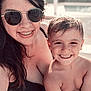 Gabriel participe au concours pour gagner de l'argent avec cette photo : child, woman, smile, sunglasses, outdoor, sunlight, happy, portrait, poolside, bare_chest, short_hair, casual, family, summer, skin, people, vacation, leisure, closeup, daytime
