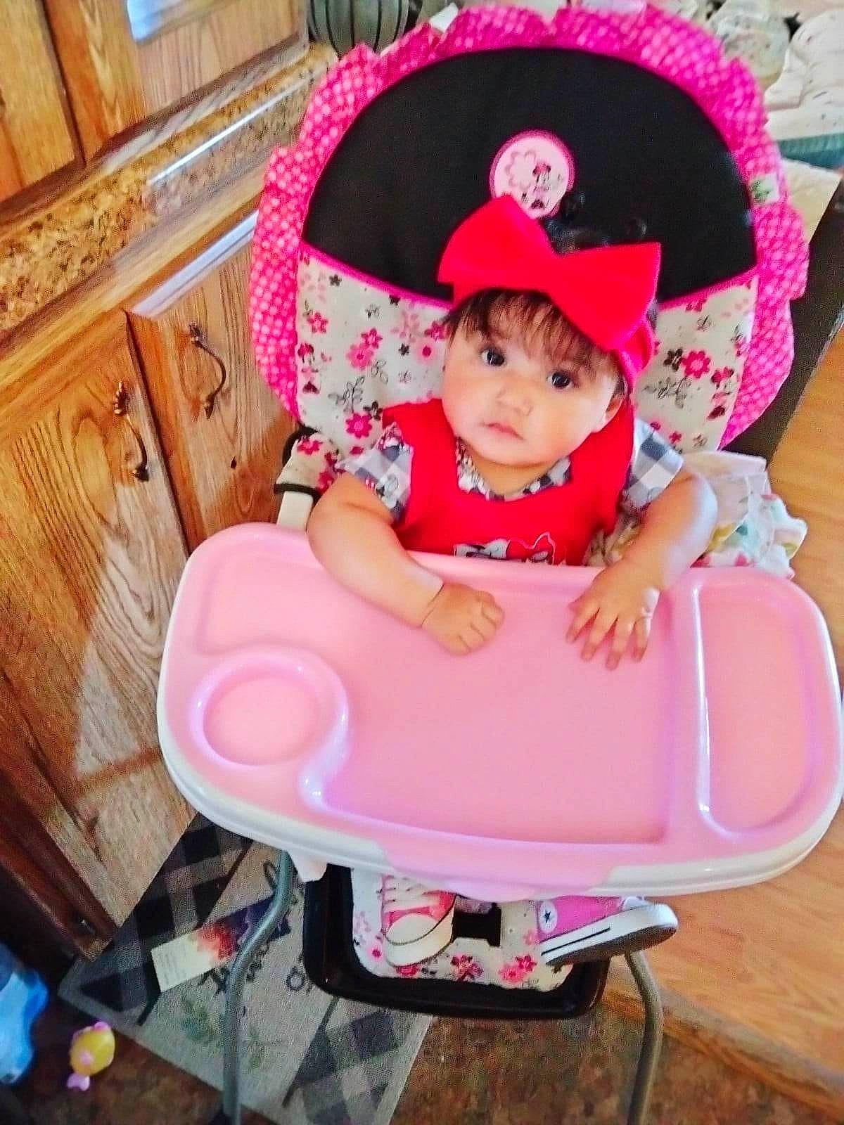 Armani is registered to the contest to win money with this photo: baby, baby_carriage, baby_products, baby_toddler_clothing, cap, chair, child, fashion_accessory, fedora, happy, hat, headgear, headwear, lap, leisure, magenta, pattern, person, pink, sitting