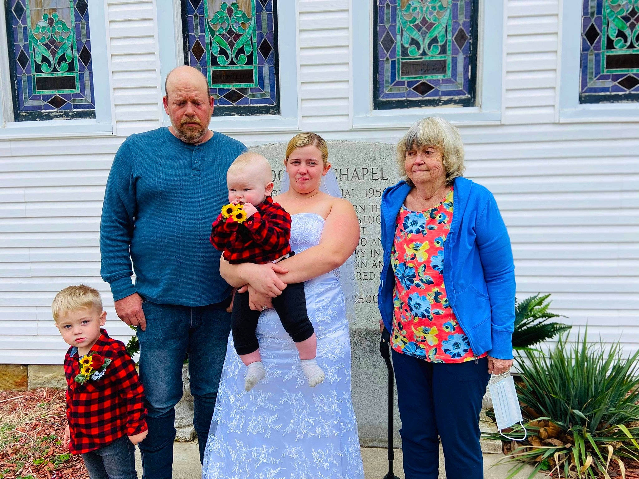 Dalton Jr is registered to the contest to win money with this photo: blue, child, clothing, event, family_taking_photos_together, fashion, fun, green, happy, joy, leaf, leisure, people, person, photograph, picture_frame, plant, red, standing, t_shirt