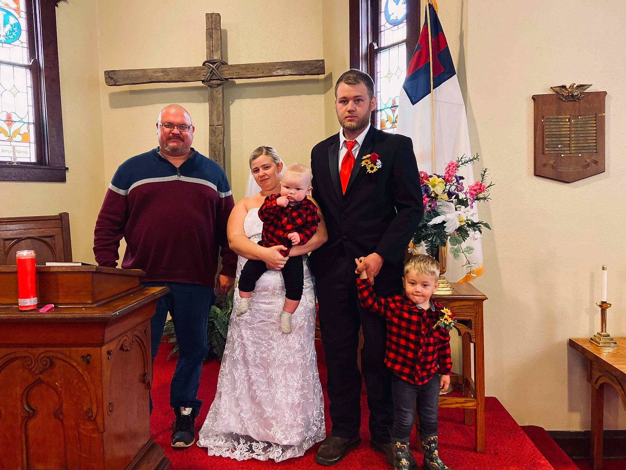Dalton Jr is registered to the contest to win money with this photo: community, dress, event, fashion, flag, flooring, formal_wear, happy, joy, people, person, photograph, picture_frame, red, smile, snapshot, suit, table, tie, toddler