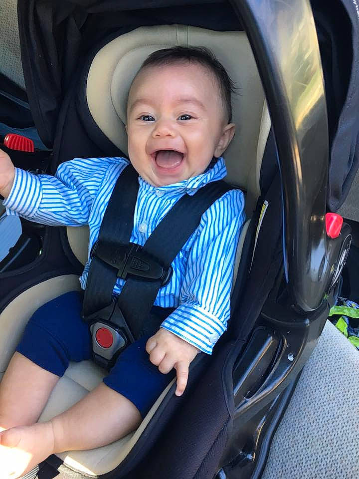 Mateus joined the competition — help win amazing prizes! baby_carriage, baby_products, blue, car, car_seat, child, cool, fun, infant, person, personal_protective_equipment, product, smile, toddler, vehicle