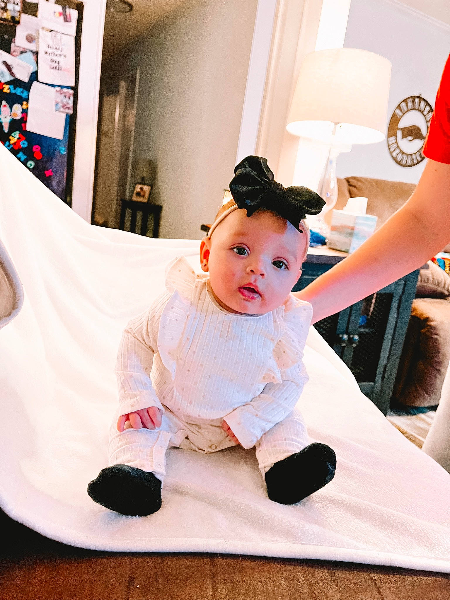 Hayzlee joined the competition — help win amazing prizes! baby, baby_toddler_clothing, child, costume, fashion_accessory, floor, flooring, fun, happy, hat, headpiece, peach, person, play, room, sitting, sleeve, sock, sportswear, t_shirt