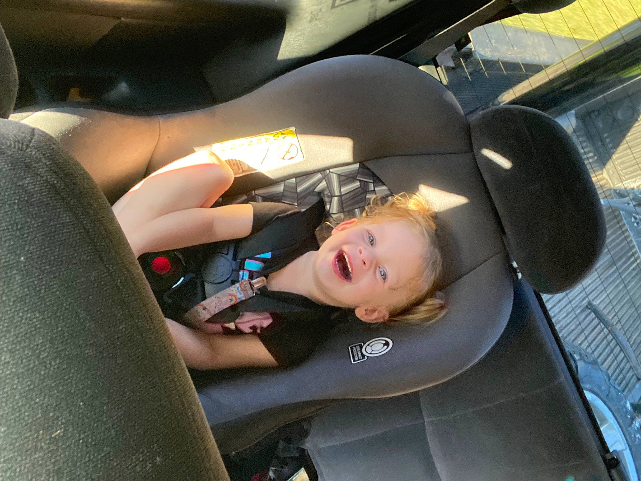 Maddie joined the competition — help win amazing prizes! auto_part, automotive_design, automotive_exterior, automotive_tire, automotive_wheel_system, car, car_seat, car_seat_cover, comfort, family_car, head_restraint, human_leg, joy, motor_vehicle, person, personal_luxury_car, smile, steering_part, steering_wheel, vehicle