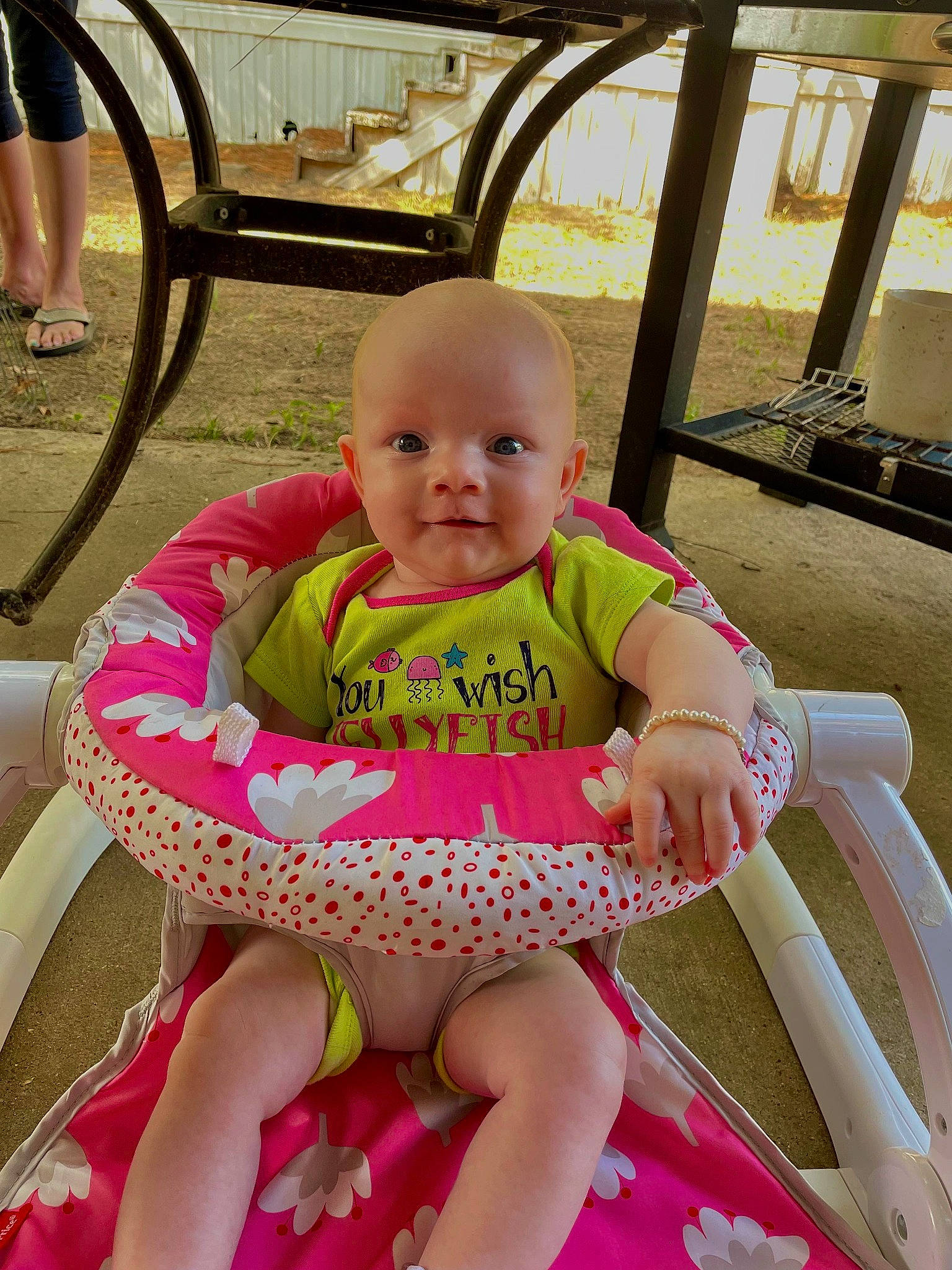 Isabella joined the competition — help win amazing prizes! baby, baby_products, baby_toddler_clothing, chair, cheek, child, comfort, facial_expression, fun, grass, happy, lap, leisure, magenta, outdoor_furniture, person, pink, shorts, skin, smile