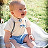 baby, child, smiling, outdoor, grass, blanket, socks, shorts, shirt, suspenders, happy, sunlight, cute, portrait, infant, person, nature, daylight, skin, hair