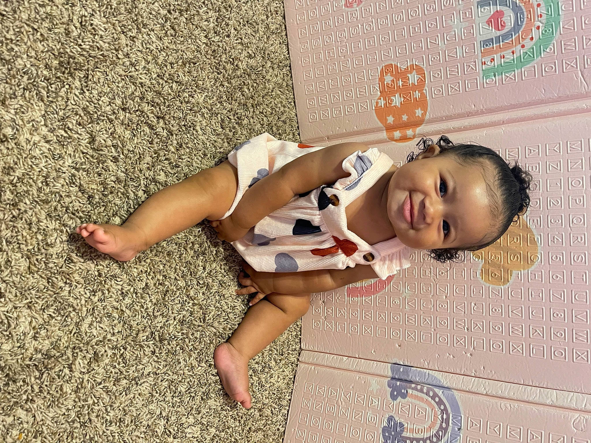 Aaliyah is registered to the contest to win money with this photo: barefoot, calf, child, flooring, foot, fun, grass, happy, human_leg, joy, knee, leisure, pattern, people_in_nature, person, shadow, smile, thigh, toddler, toe