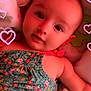Brianna participe au concours pour gagner de l'argent avec cette photo : baby, infant, child, portrait, face, cute, dress, floral_pattern, colorful, lying_down, pink_hearts, soft_lighting, indoors, closeup, adorable, smiling, skin, person, young, love
