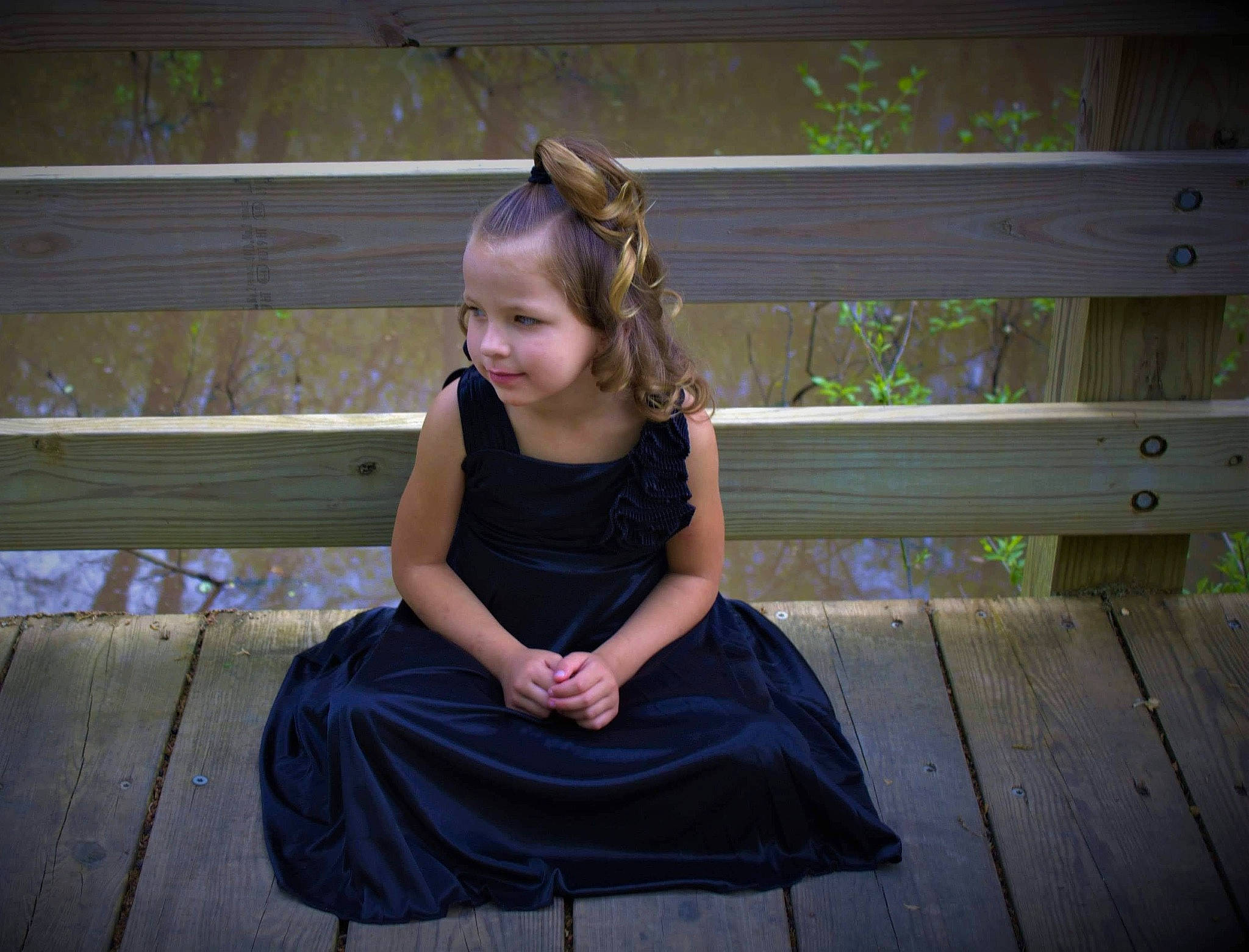 Alize is registered to the contest to win money with this photo: child, dress, electric_blue, eye, flash_photography, flooring, formal_wear, fun, grass, happy, leisure, magenta, pattern, person, plant, purple, shoulder, sitting, toddler, tree