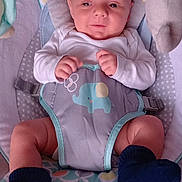 Alexander is registered to the contest to win money with this photo: baby, bed, blanket, clothing, crib, cushion, face, furniture, glove, hat, head, homedecor, hosiery, infantbed, newborn, pants, person, photography, portrait, sock