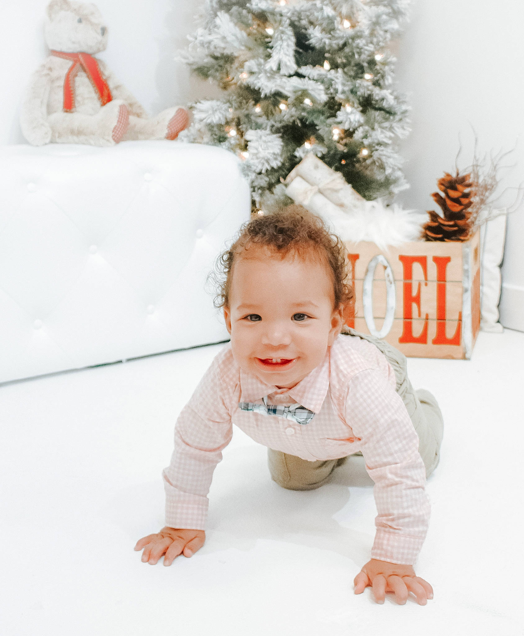 Carter is registered to the contest to win money with this photo: baby, baby_toddler_clothing, christmas_ornament, christmas_tree, event, flooring, freezing, fun, grass, happy, holiday, holiday_ornament, joy, ornament, person, photograph, sleeve, smile, snow, toddler