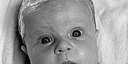 Violet is registered to the contest to win money with this photo: baby, bath_time, black_and_white, child, closeup, curly_hair, cute, drool, expression, eyes, face, hair, head, infant, newborn, portrait, skin, soap, towel, wet