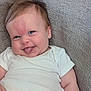 Violet joined the competition — help win amazing prizes! baby, child, infant, smiling, tongue_out, white_onesie, couch, textured_fabric, cute, happy, chubby_cheeks, blue_eyes, hair, skin_mark, indoors, portrait, sitting, relaxed, person, one_person