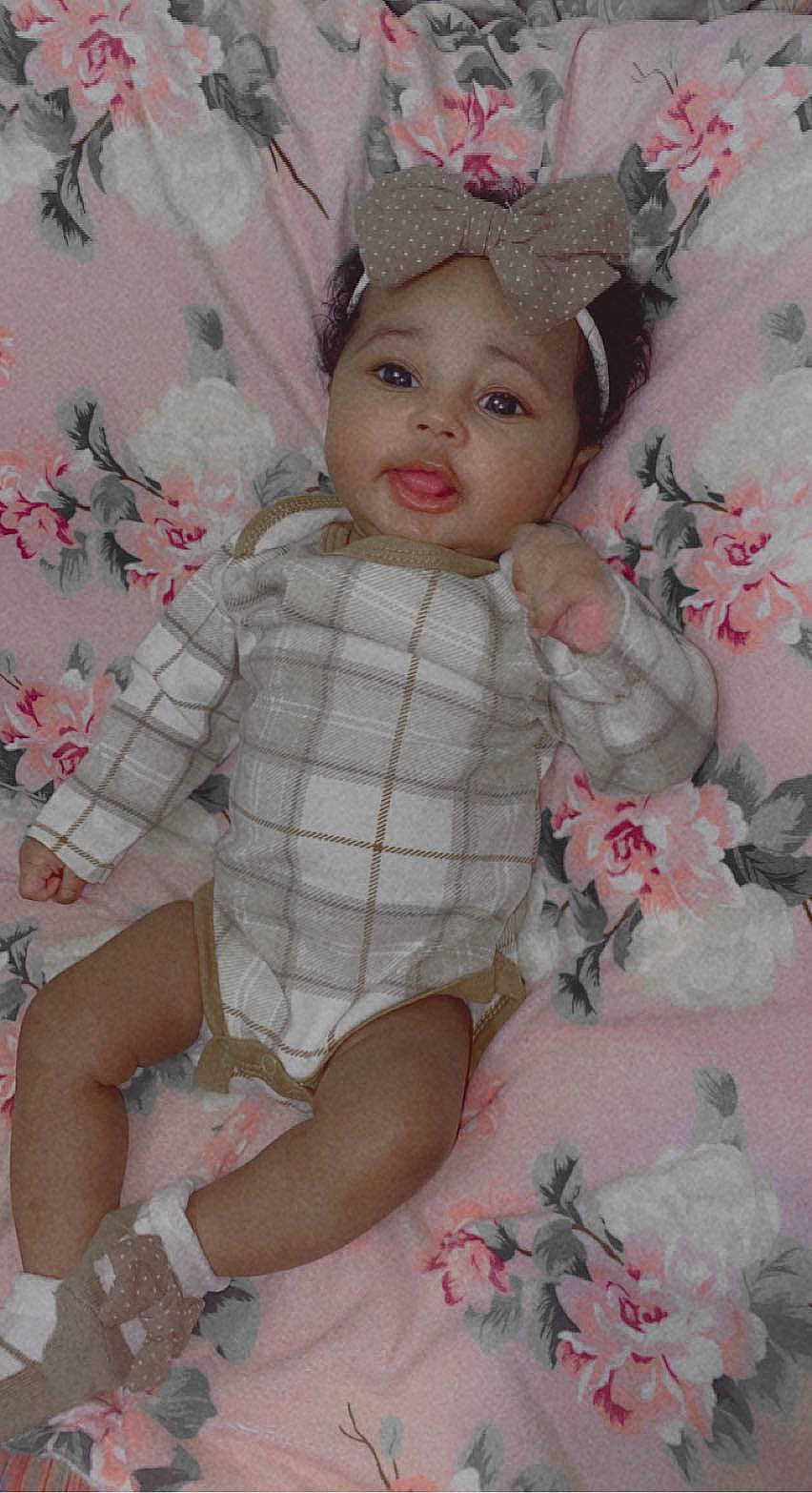 Sofia is registered to the contest to win money with this photo: baby, baby_toddler_clothing, cheek, chin, doll, dress, eye, eyelash, face, head, headgear, headwear, iris, leg, lip, person, pink, skin, sleeve, thigh