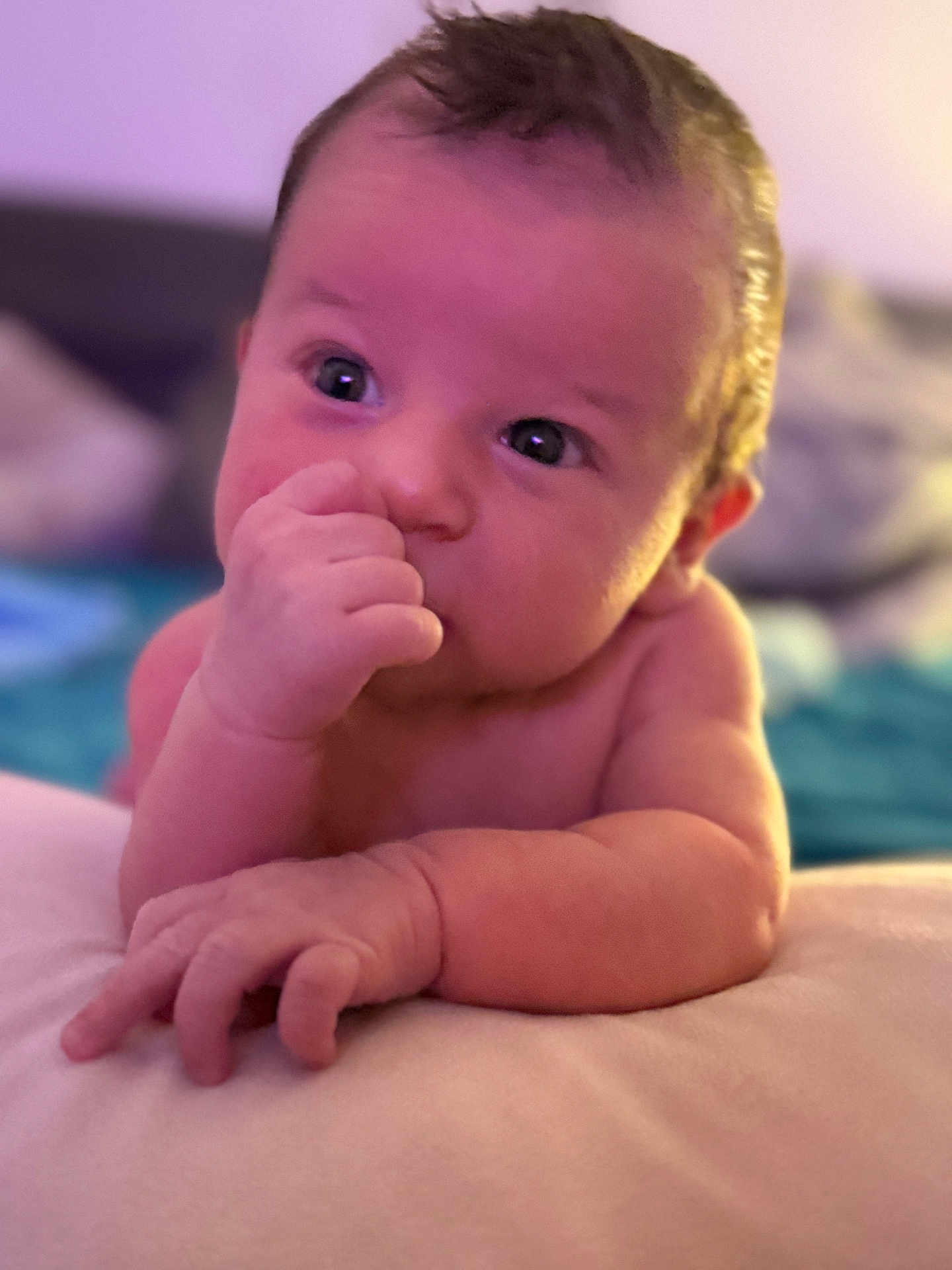 Theodor joined the competition — help win amazing prizes! baby, infant, child, face, hand, thumb, skin, close_up, expression, lying_down, cute, soft_lighting, indoor, portrait, young, newborn, person, couch, blurred_background, curious
