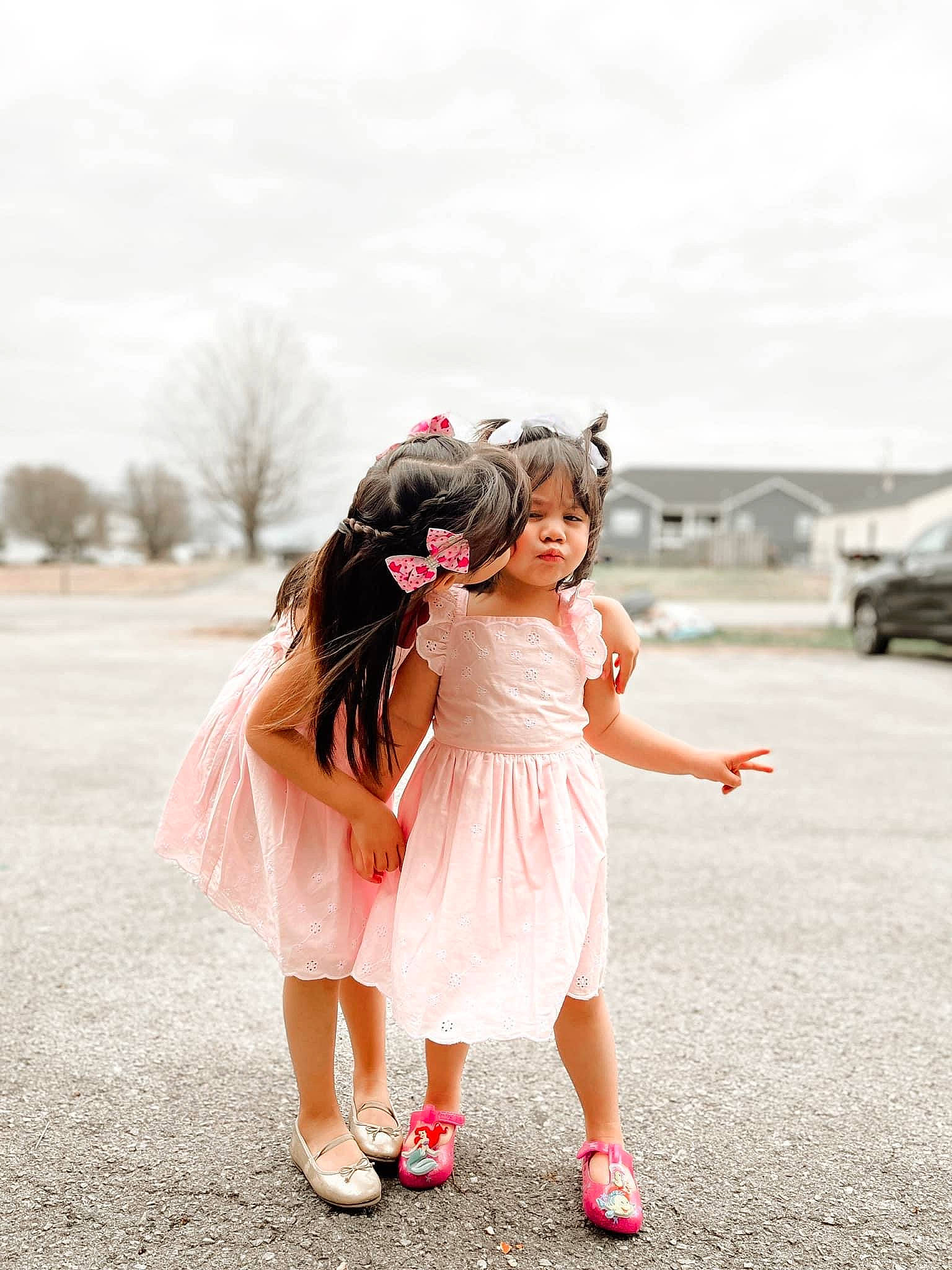 Sisters joined the competition — help win amazing prizes! child, dress, event, flash_photography, footwear, fun, gesture, grass, happy, leg, long_hair, person, pink, plant, recreation, sandal, shoulder, skin, sky, textile