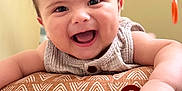 Isaac Tamayo joined the competition — help win amazing prizes! baby, baby_clothing, bright, carpet, cheerful, child, closeup, cute, expression, face, happy, indoor, infant, patterned_cushion, playtime, portrait, smiling, soft_toys, toy, young_child