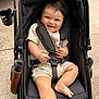 Isaac Tamayo is registered to the contest to win money with this photo: baby, baby_boy, baby_fashion, baby_girl, black_stroller, casual_clothing, child, child_care, concrete, cute, daylight, happy, infant, outdoor, portrait, seatbelt, sitting, smiling, stroller, sunlight