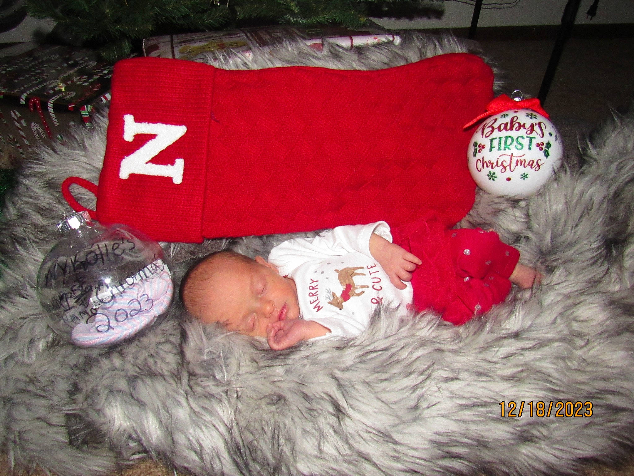 Nykolle joined the competition — help win amazing prizes! baby_toddler_clothing, bedding, bedtime, child, christmas, christmas_eve, comfort, event, font, fur, fur_clothing, lap, linens, nap, person, room, sleep, sleeve, textile, throw_pillow